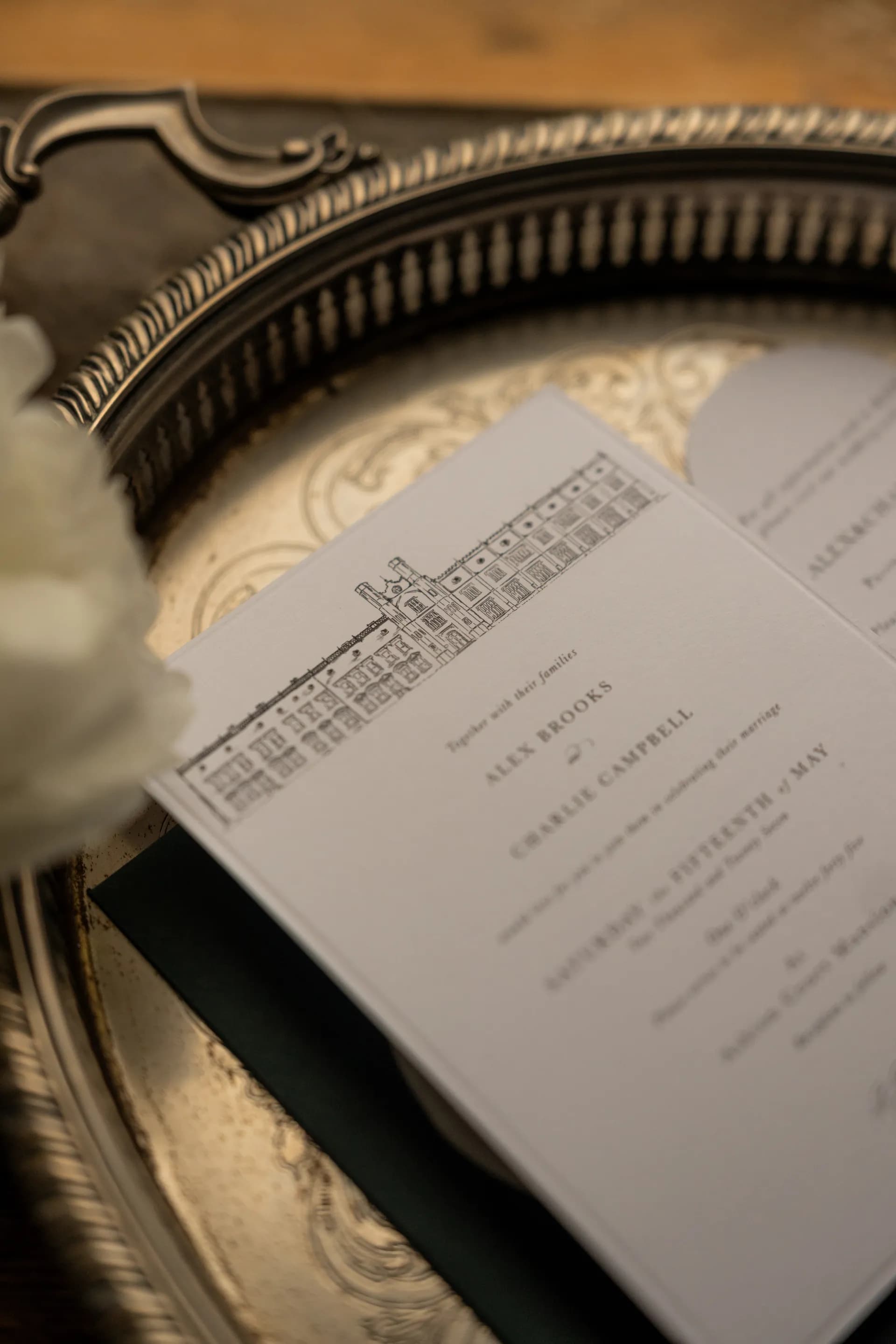 Wedding stationery with a line drawing of the Mansion